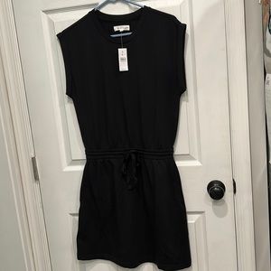 Loft black elastic waisted dress Size small. Never worn with tags.